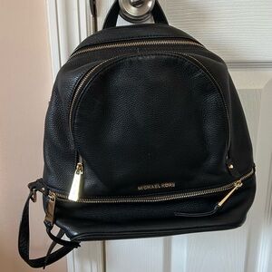 Michael Kors Black Pebbled Leather Backpack with Gold Zippers
